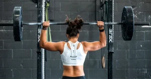 Woman strength training while learning about creatine for women